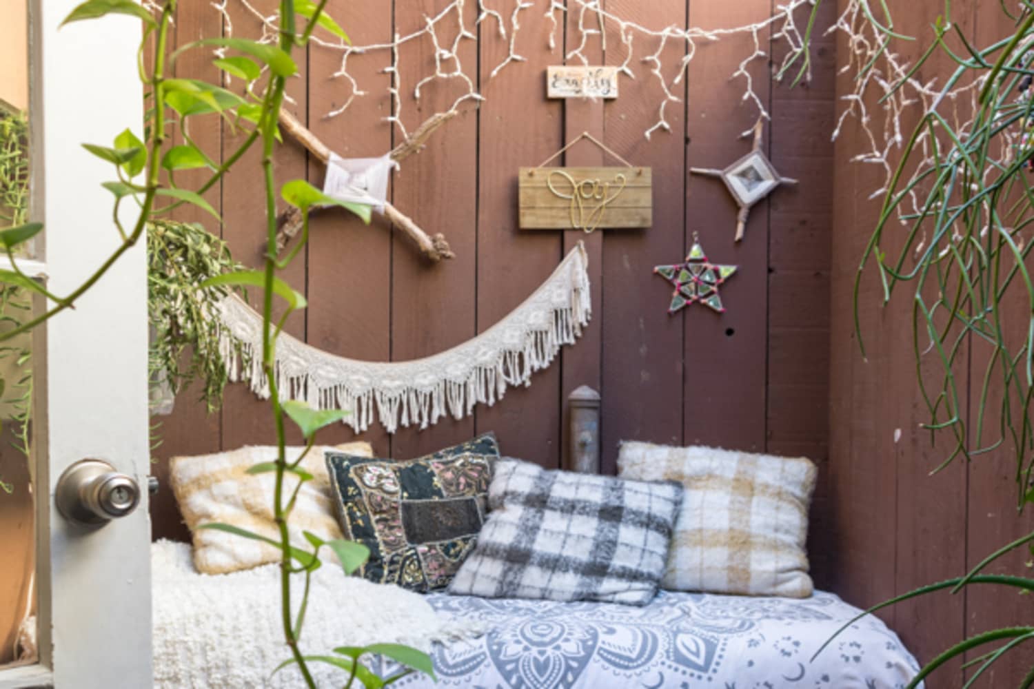 The Brilliant Hack To Keep Your Outdoor Cushions In Place On A Windy Day