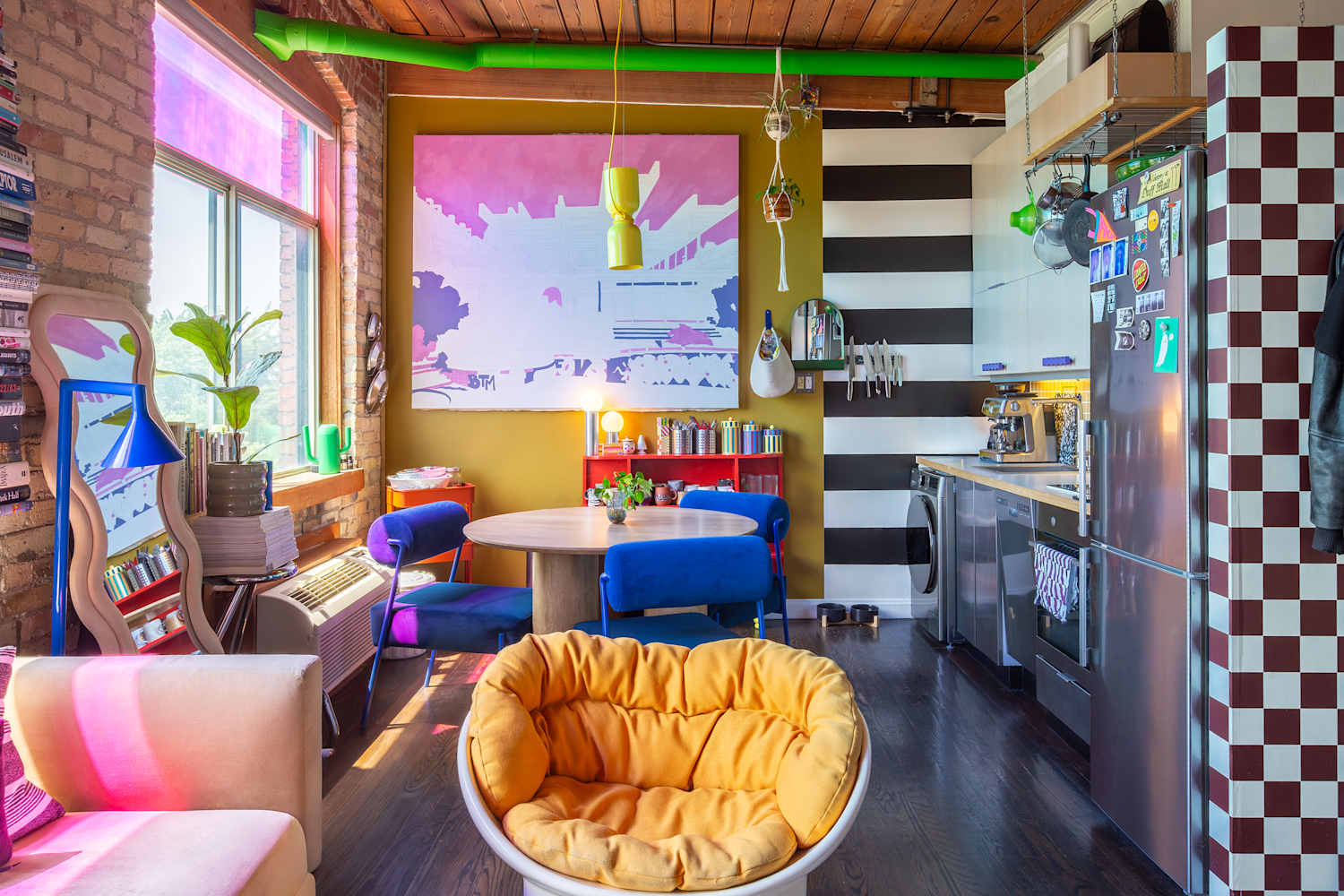 She Didn't Want Her TV Taking Up Art Real Estate — So She Hung It from the Ceiling