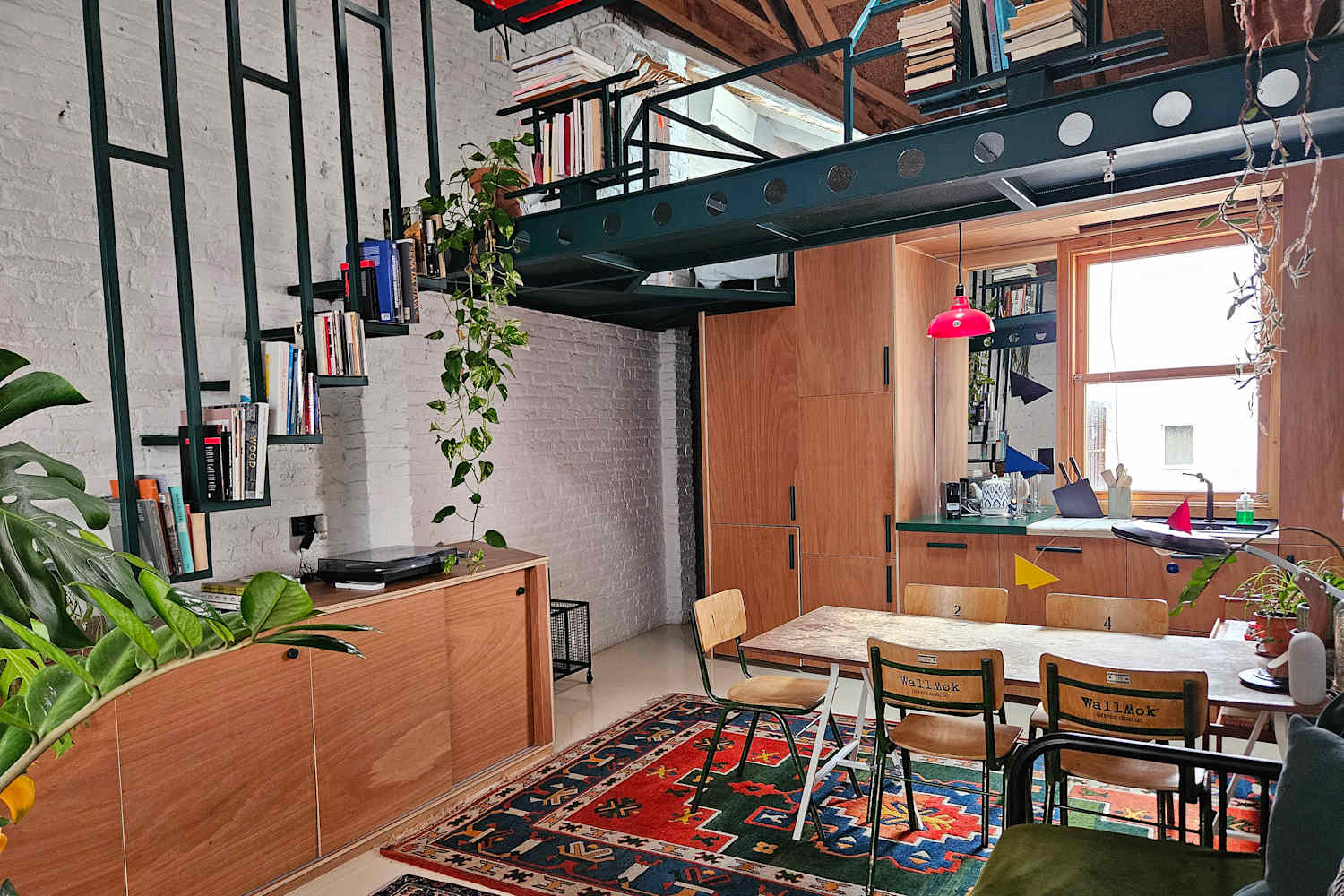 An Architect Reimagined Her 485-Square-Foot Studio with a Very Cool Lofted Steel Bedroom