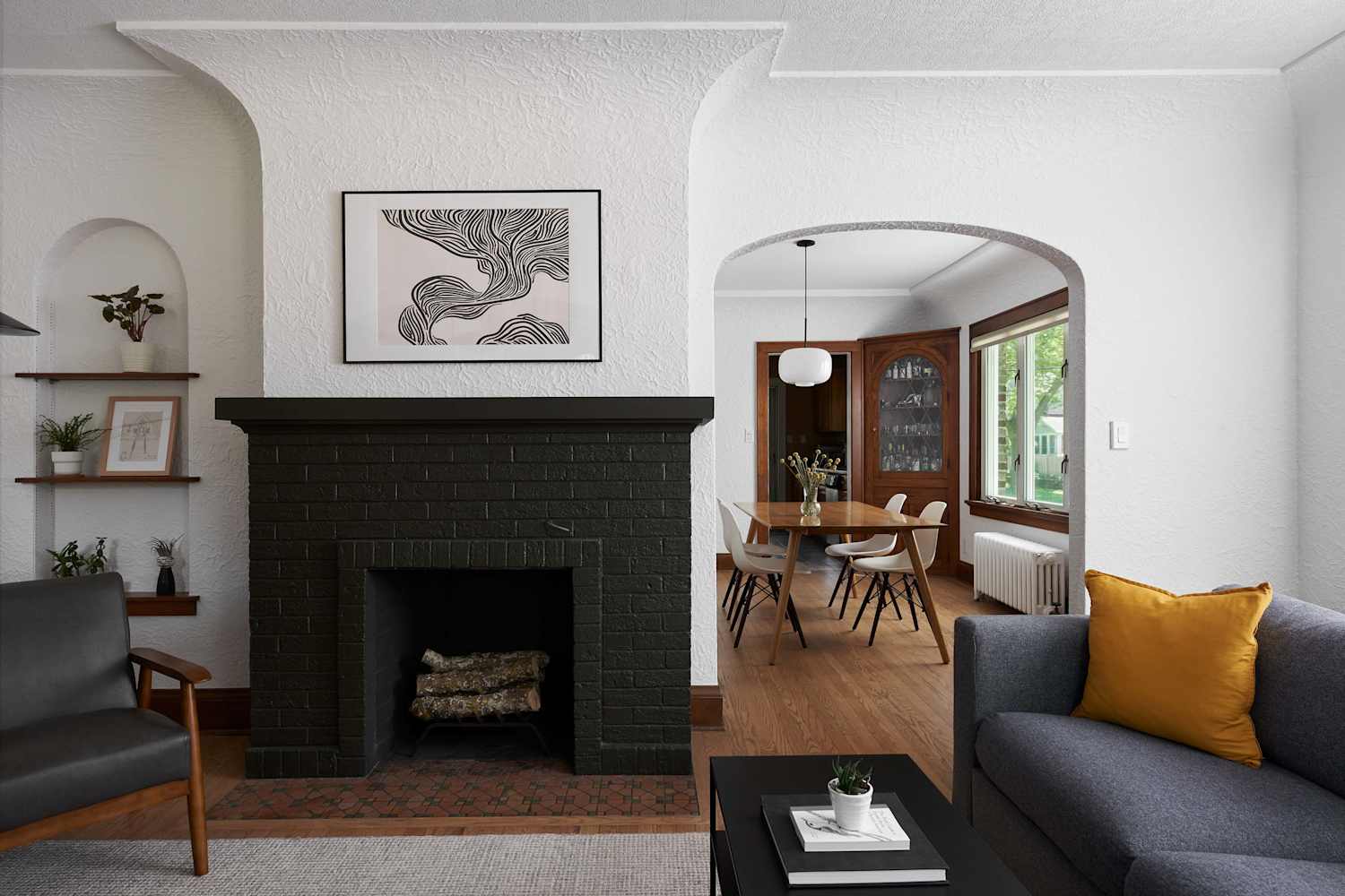 This Charming 98-Year-Old Bungalow's Bold Green Fireplace Absolutely Stuns