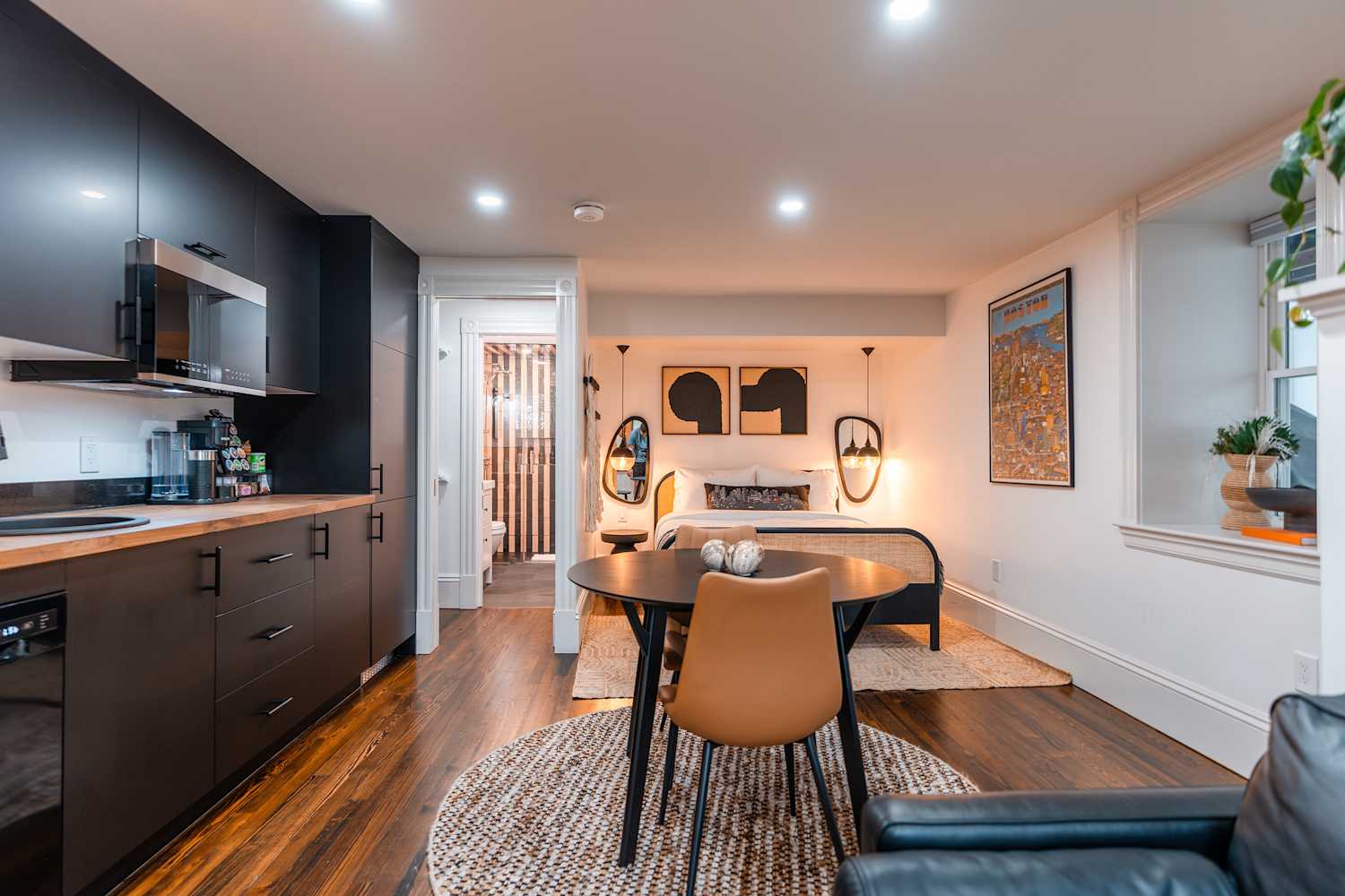 They Spent $80K Turning a Dirt Basement into a Chic Boston Studio