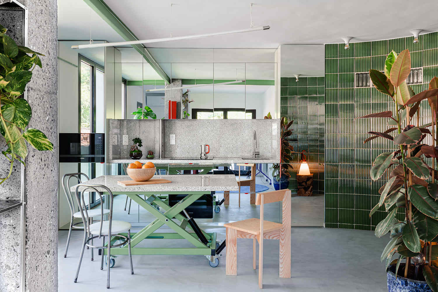 A Mirrored Kitchen Completely Transforms This 645-Square-Foot Apartment