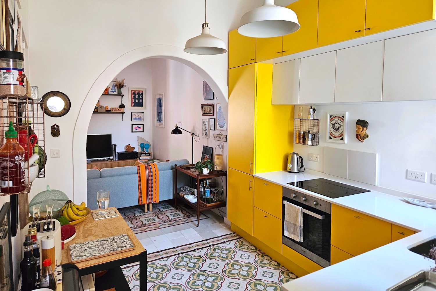 This Owner Was So Over Beige, He Put a Sunshine-Yellow Kitchen in His Malta Home