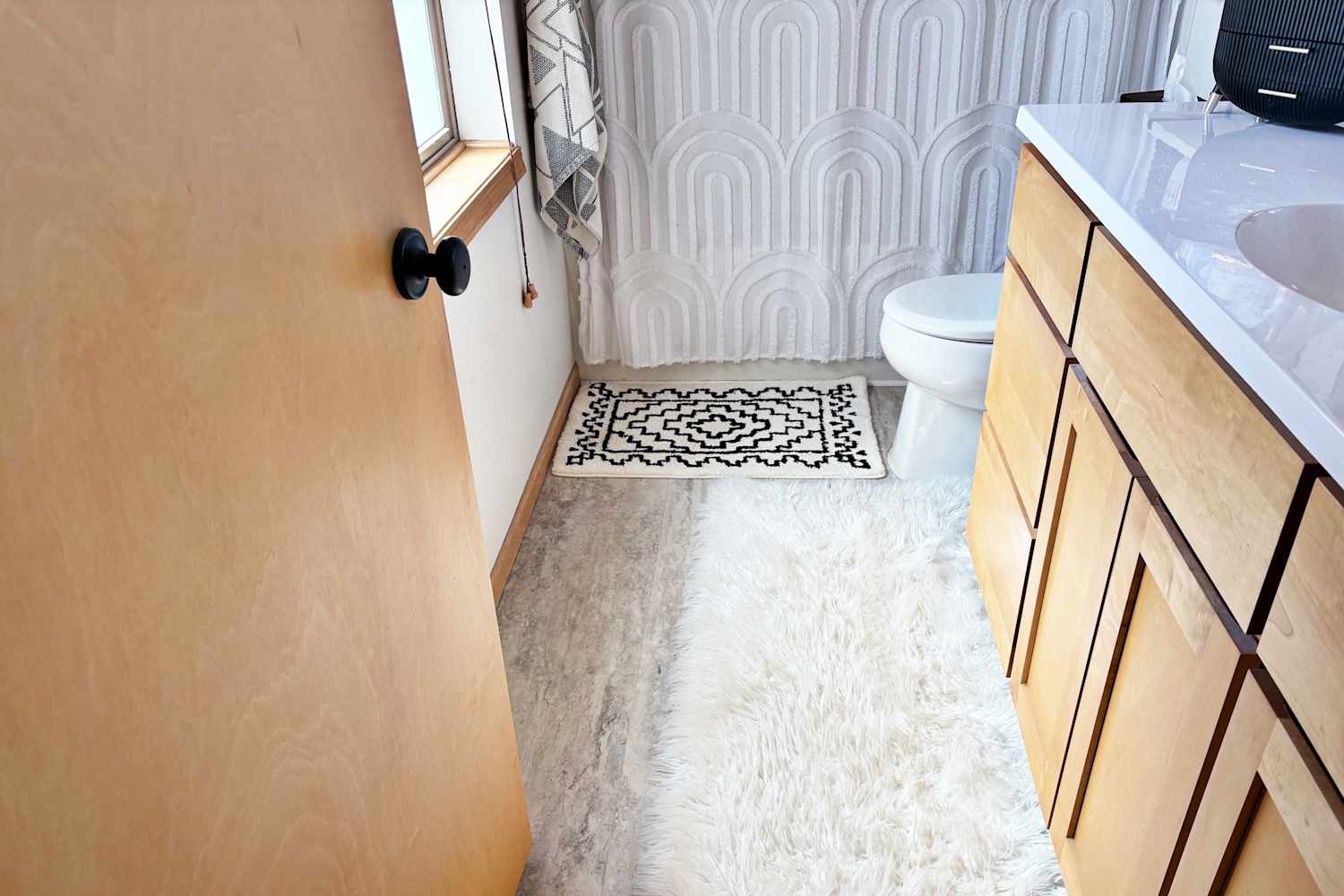 I Put a White Shag Rug in My Bathroom, and My Only Regret Is Not Doing It Sooner