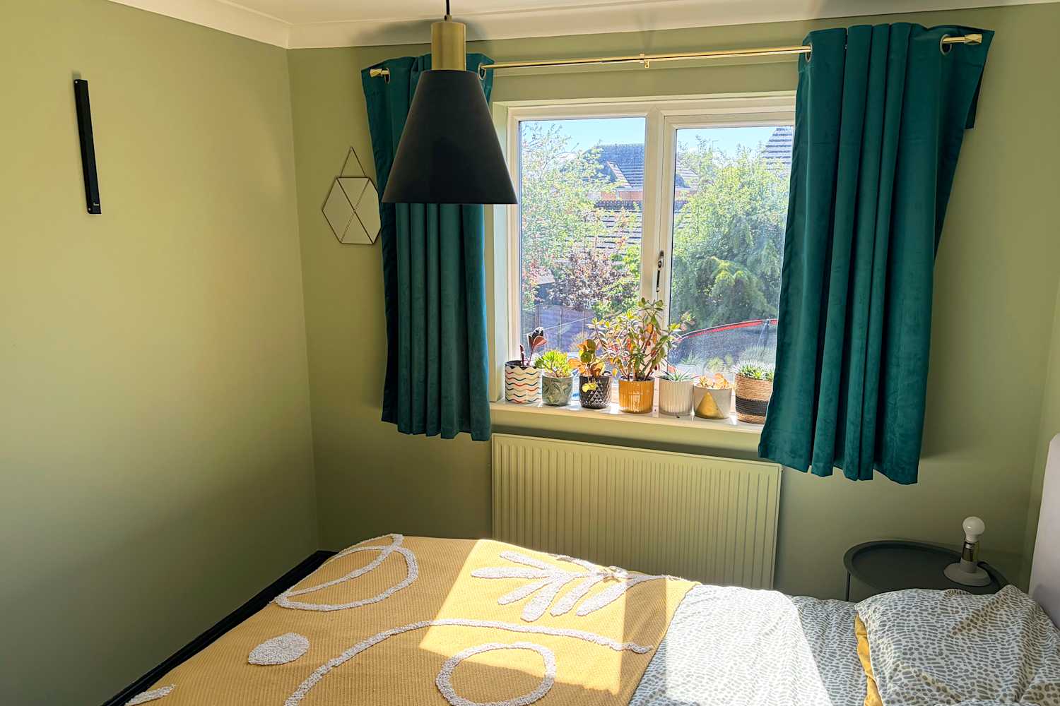 I Put This Storage Gem in My Guest Bedroom, and It Created an Instant Closet