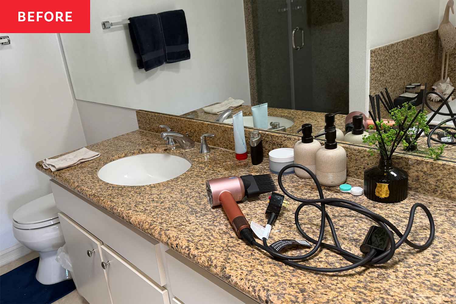 I Put a Glass Pitcher in My Bathroom, and It’s the Chicest Storage Trick