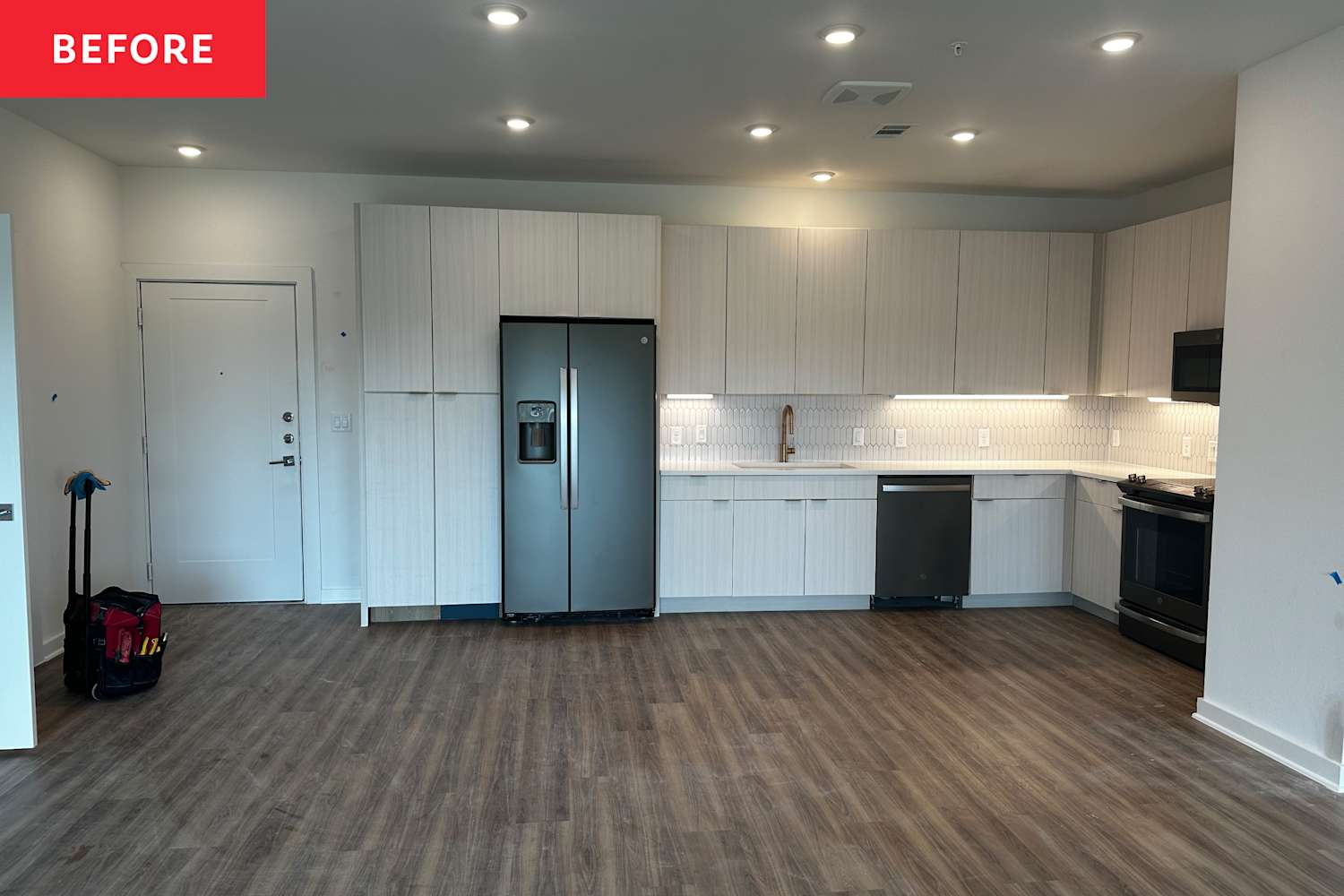 This Builder-Grade Kitchen Ditched All-White for Moody Merlot and Bold Wallpaper