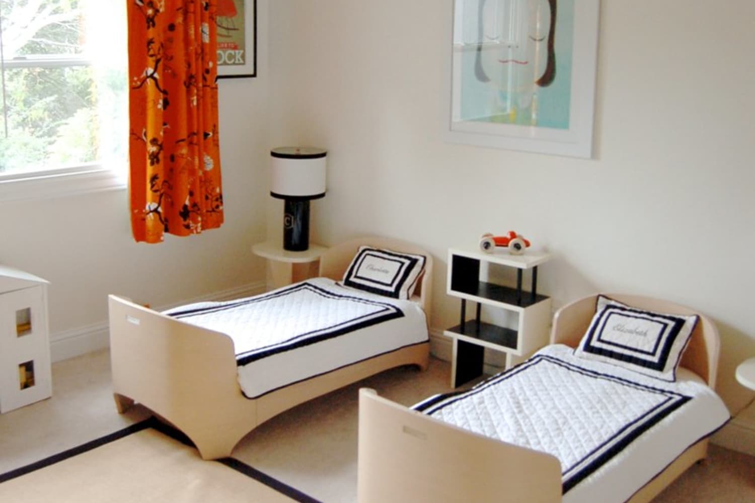 Two cribs in small room top