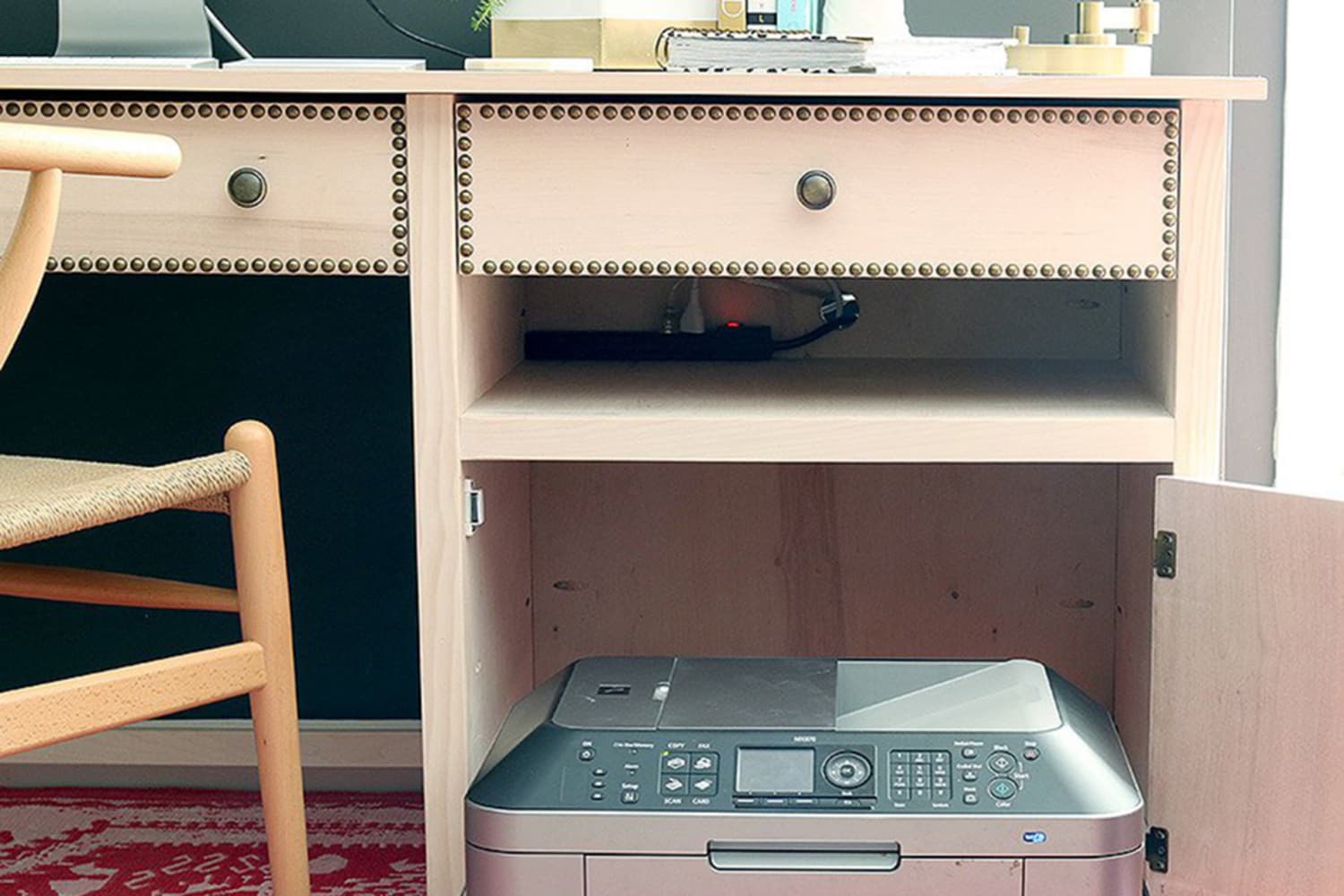 Desk with hidden printer clearance storage