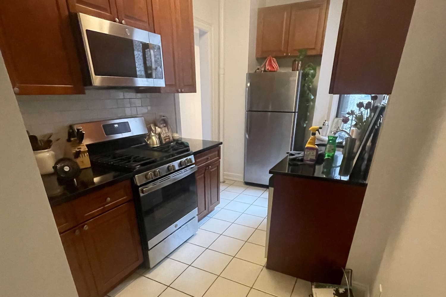 This  Renter-Friendly DIY Hack Transformed These Dark Kitchen Cabinets