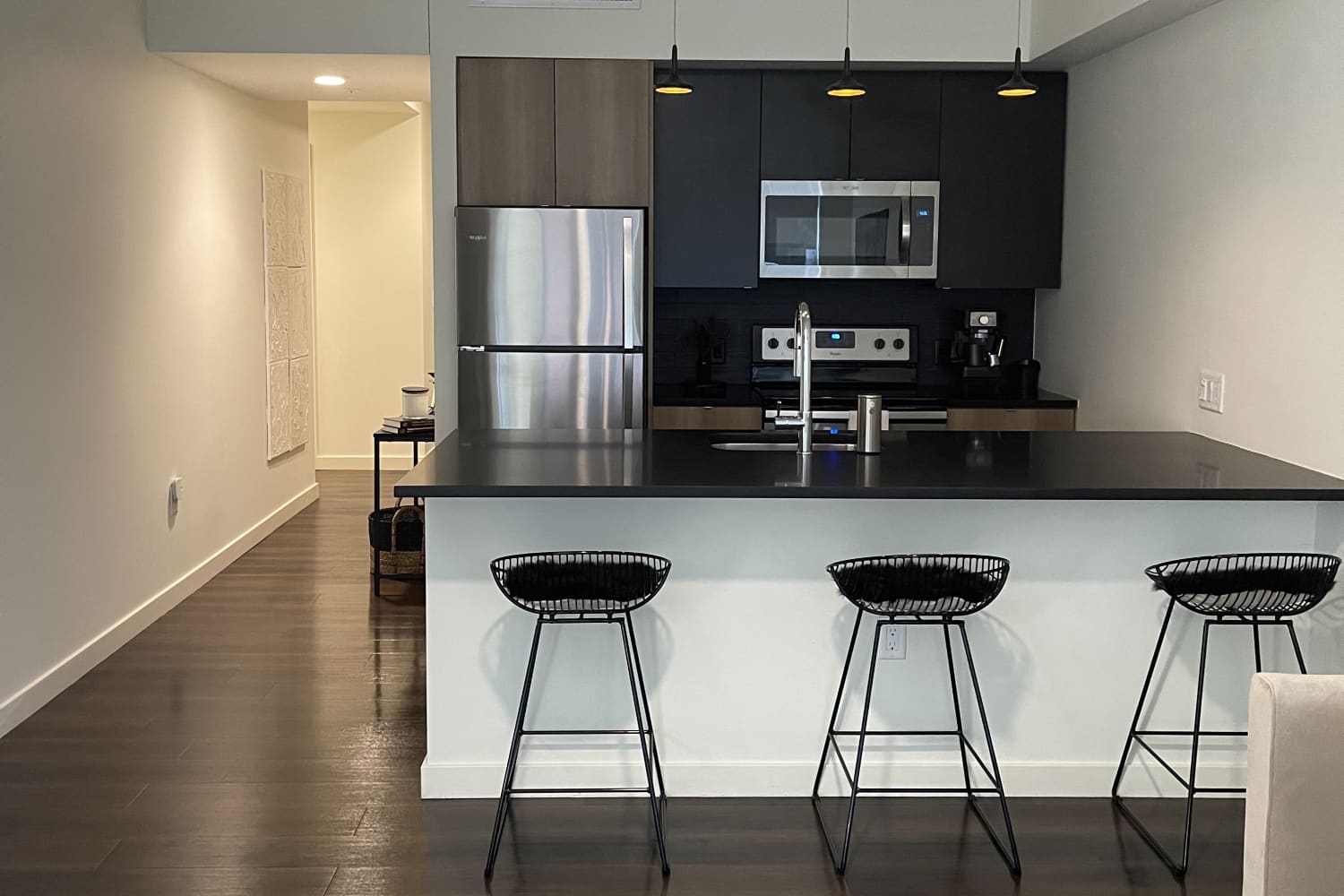 A Renter Uses Black to Hack a 'Bland' 655-Square-Foot Rental into Moody ...