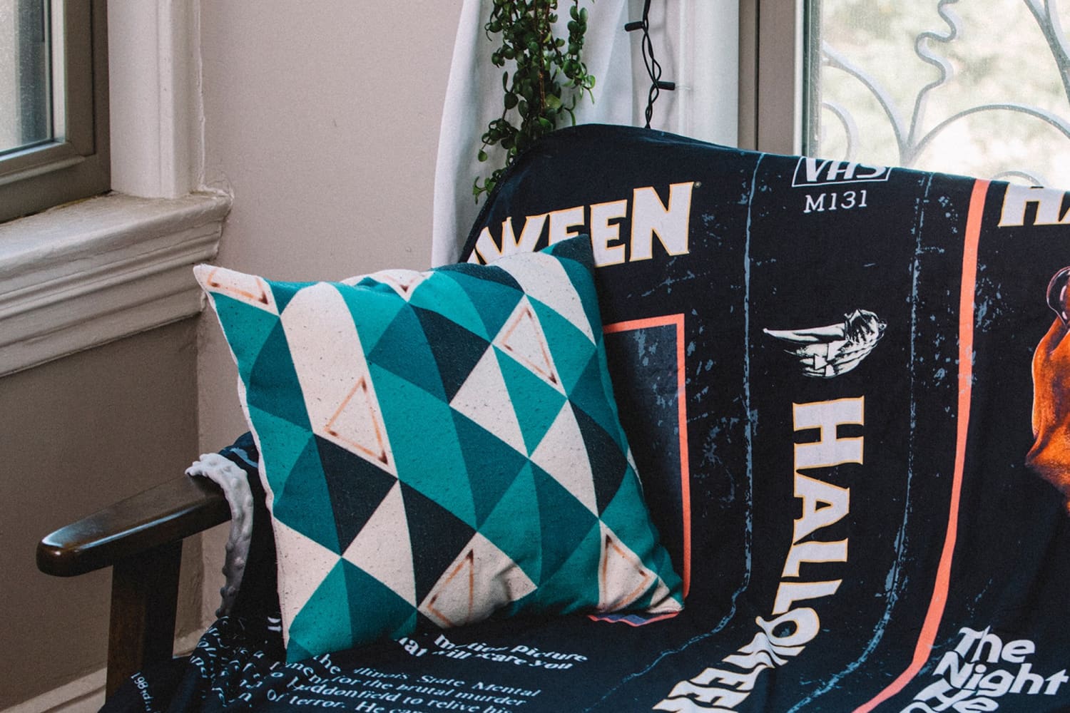 These Throw Blankets Look Like Classic Horror Movie VHS Tapes