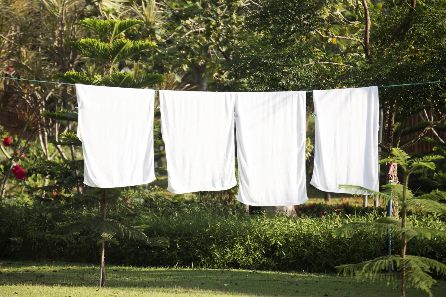 I Installed a Retractable Clothesline in the Yard to Line Dry My Sheets Apartment Therapy