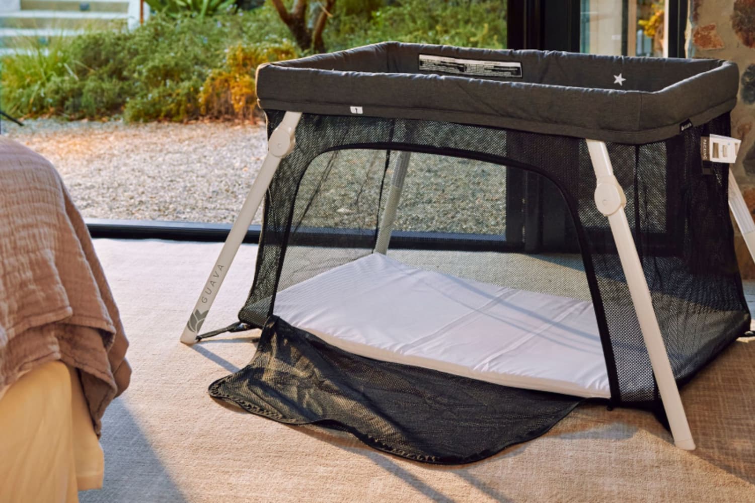 Guava Lotus Travel Crib Review Cubby