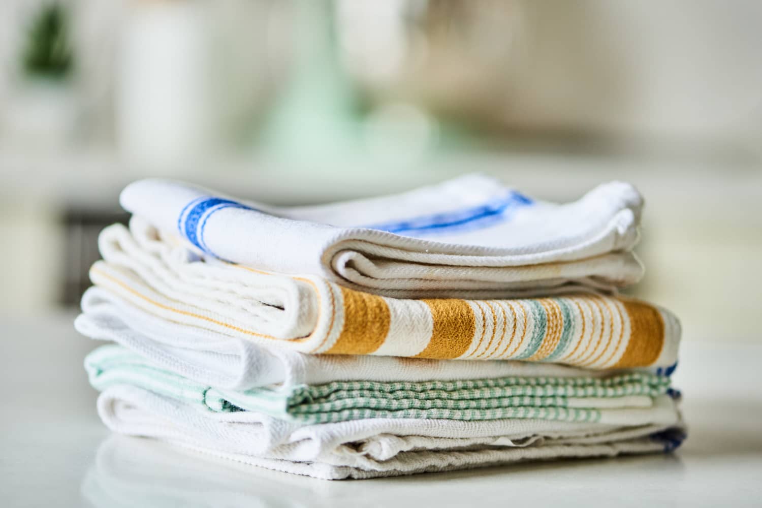 The Brilliantly Easy Trick I Can’t Stop Doing With My Kitchen Towels (It’s So Cute)