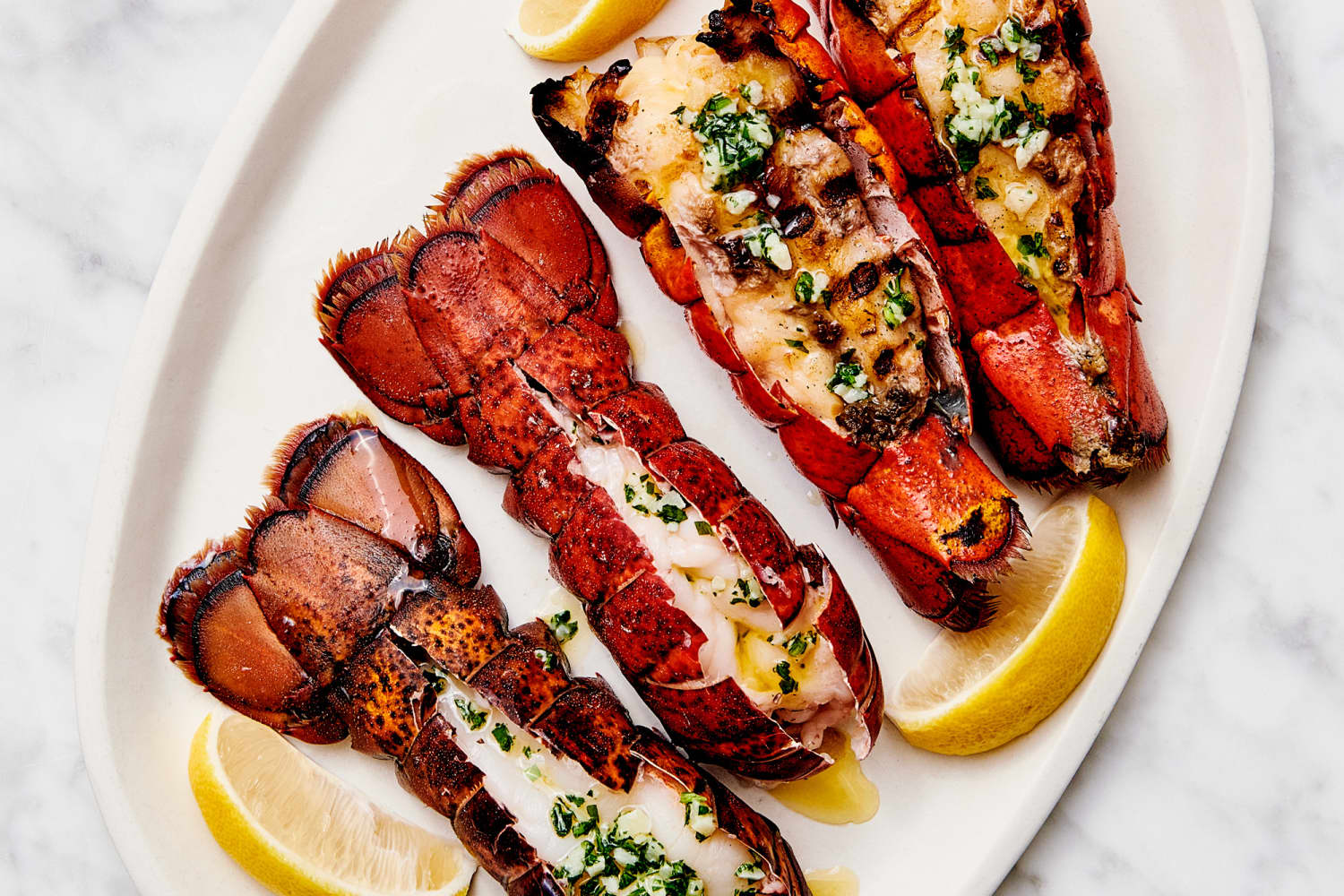 https://cdn.apartmenttherapy.info/image/upload/f_auto,q_auto:eco,c_fill,g_auto,w_1500,ar_3:2/k%2FPhoto%2FRecipes%2F2022-11-how-to-cook-lobster-tails%20%2FHOW-TO-COOK-LOBSTER-TAILS-200