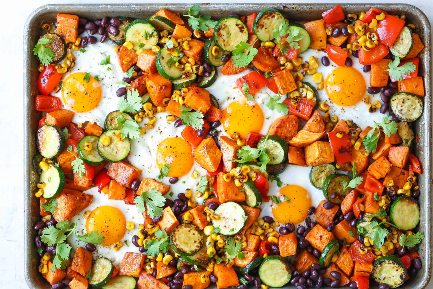 Sheet Pan Sweet Potatoes and Black Bean Hash via The Kitchn