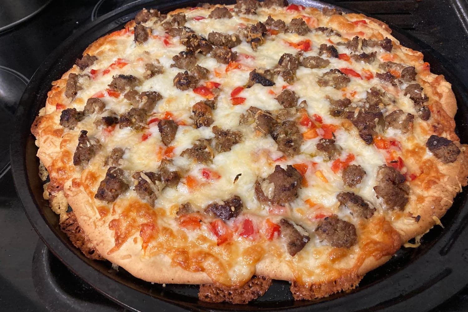 Le Creuset Just Dropped a Pizza Stone That Makes It Easy to Make Pizzeria-Quality Pies at Home