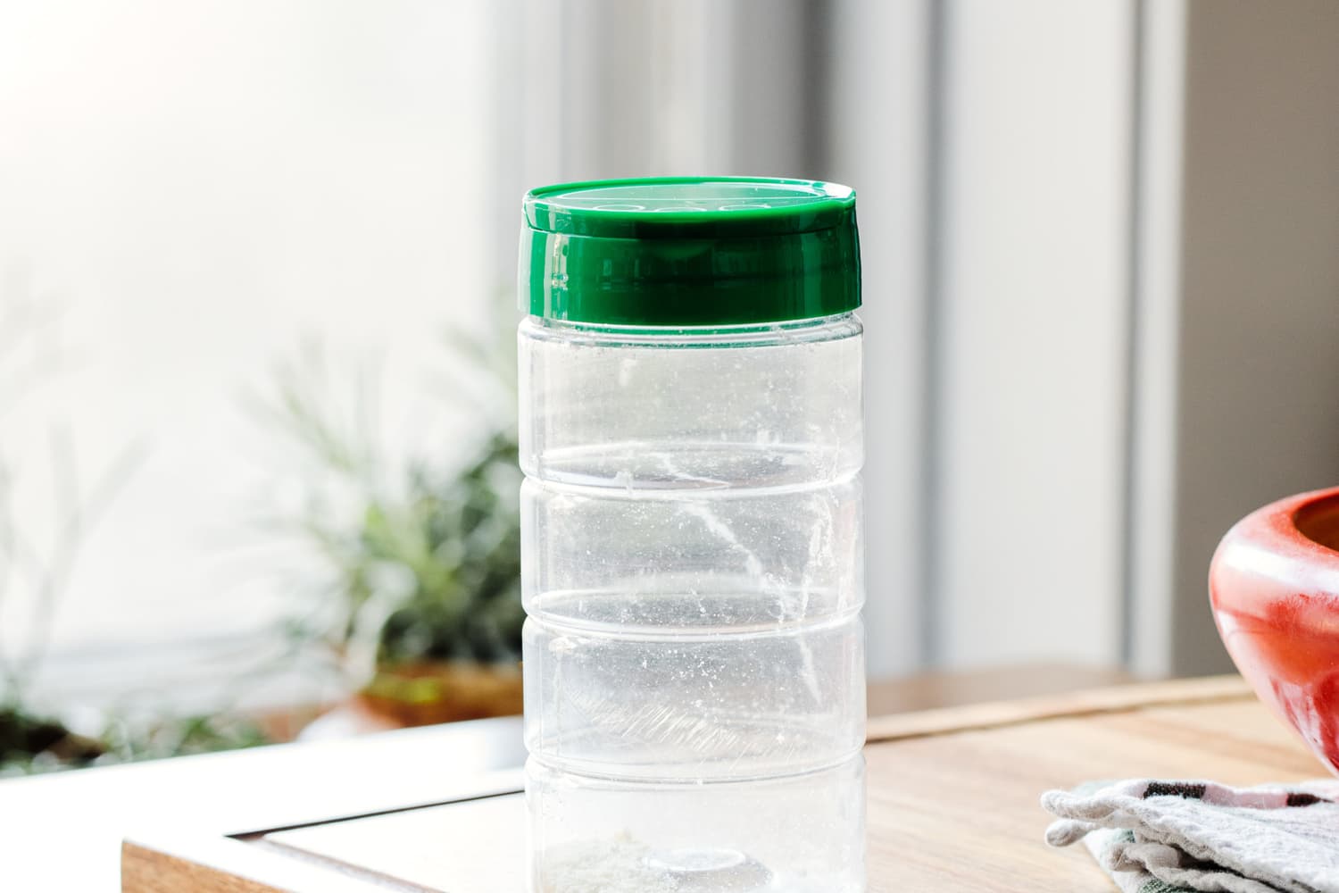 Use Empty Parmesan Cheese Container to Store Baking Soda Apartment