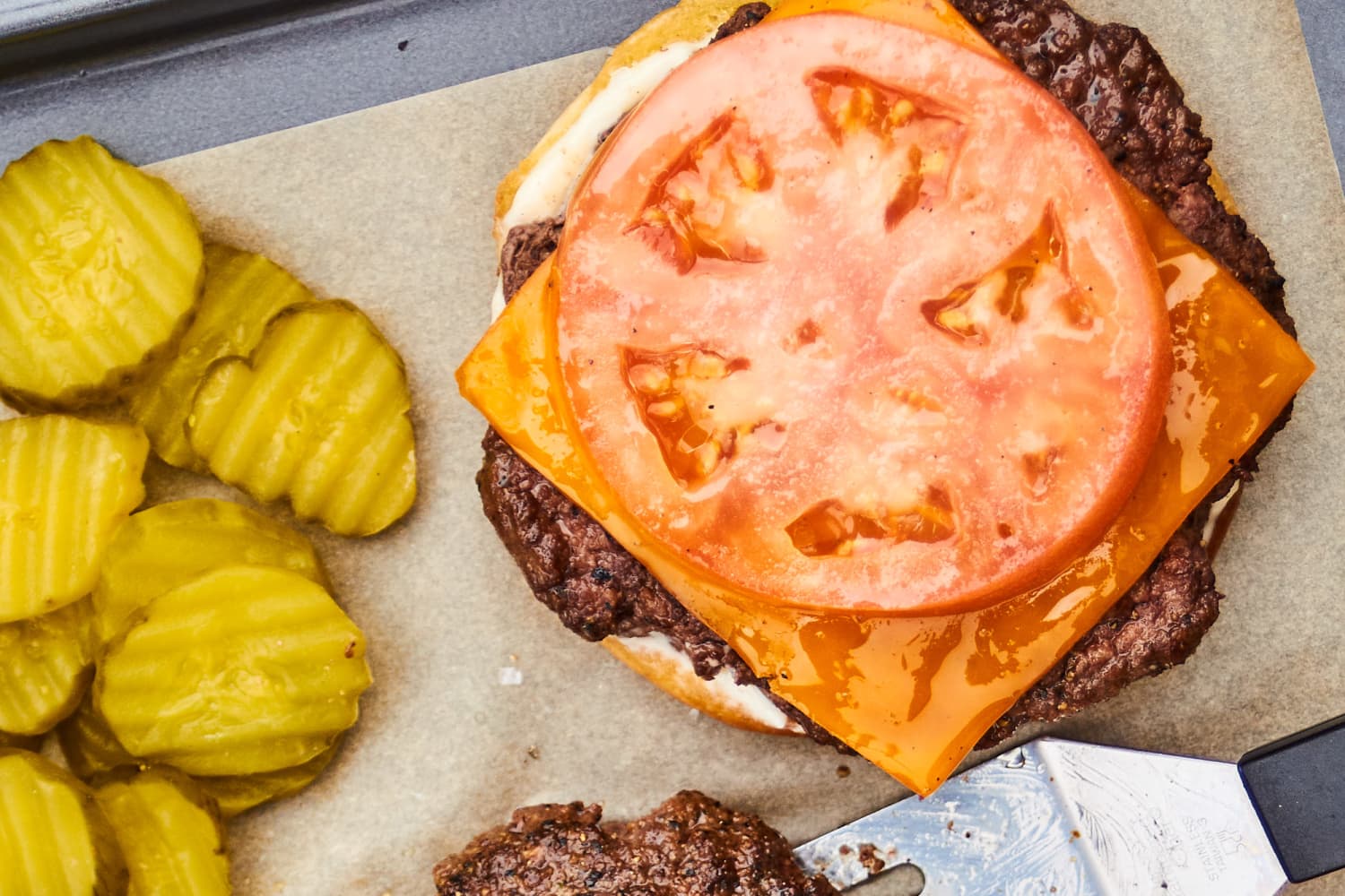The Stainless-Steel Grill Press That Guarantees Even Browning Every Time (It’s Great for More Than Meat, Too!) 