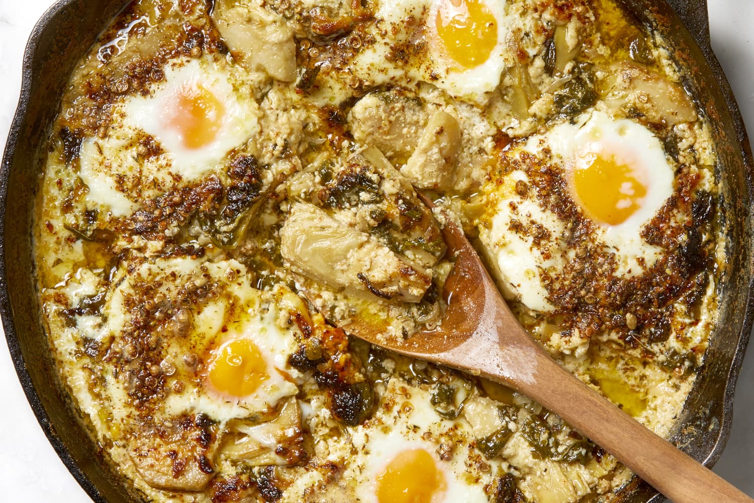 These Cheesy Spinach & Artichoke Baked Eggs Taste JUST Like Your Favorite Dip