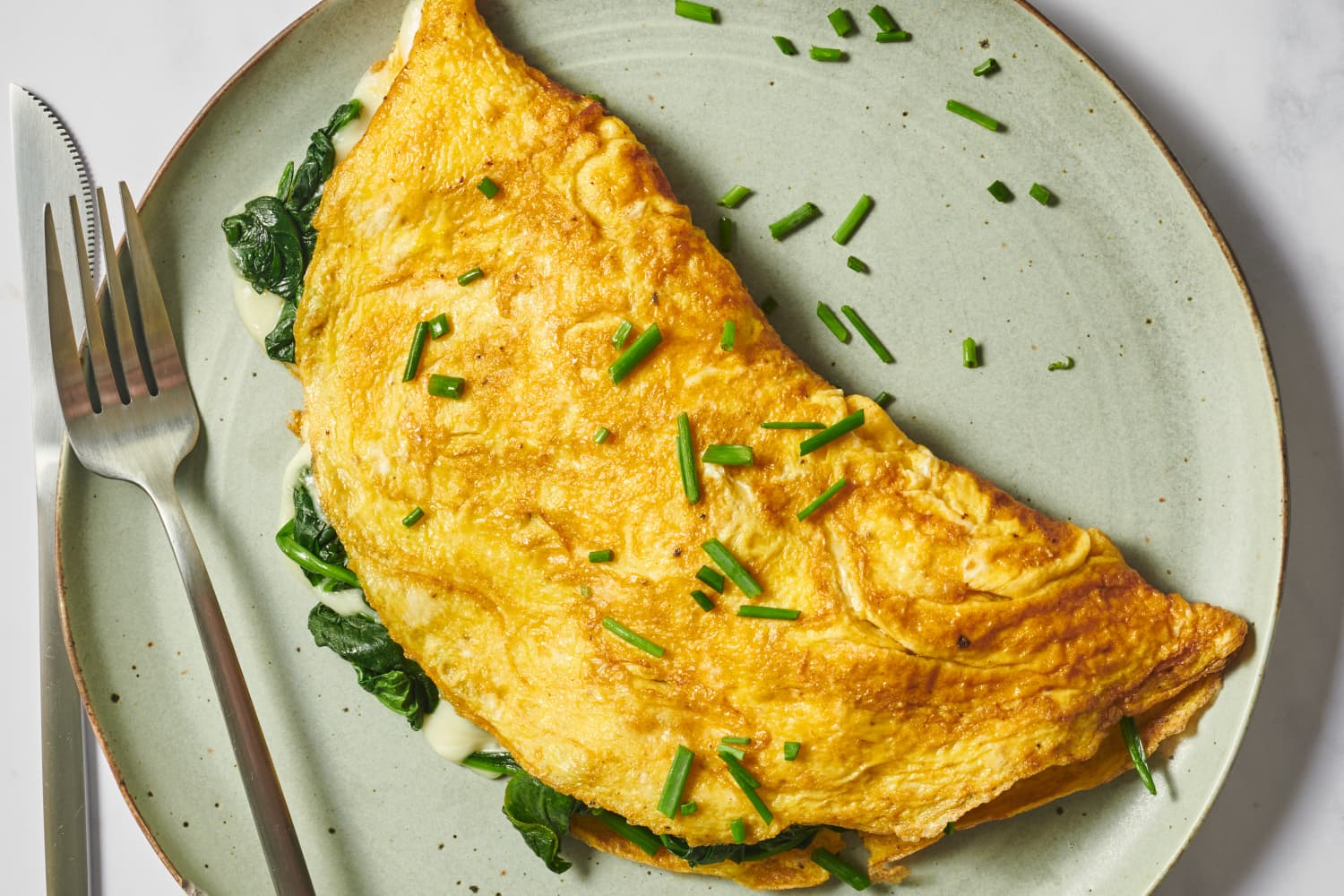 How to Make an Omelet A StepbyStep Recipe with Photos The Kitchn