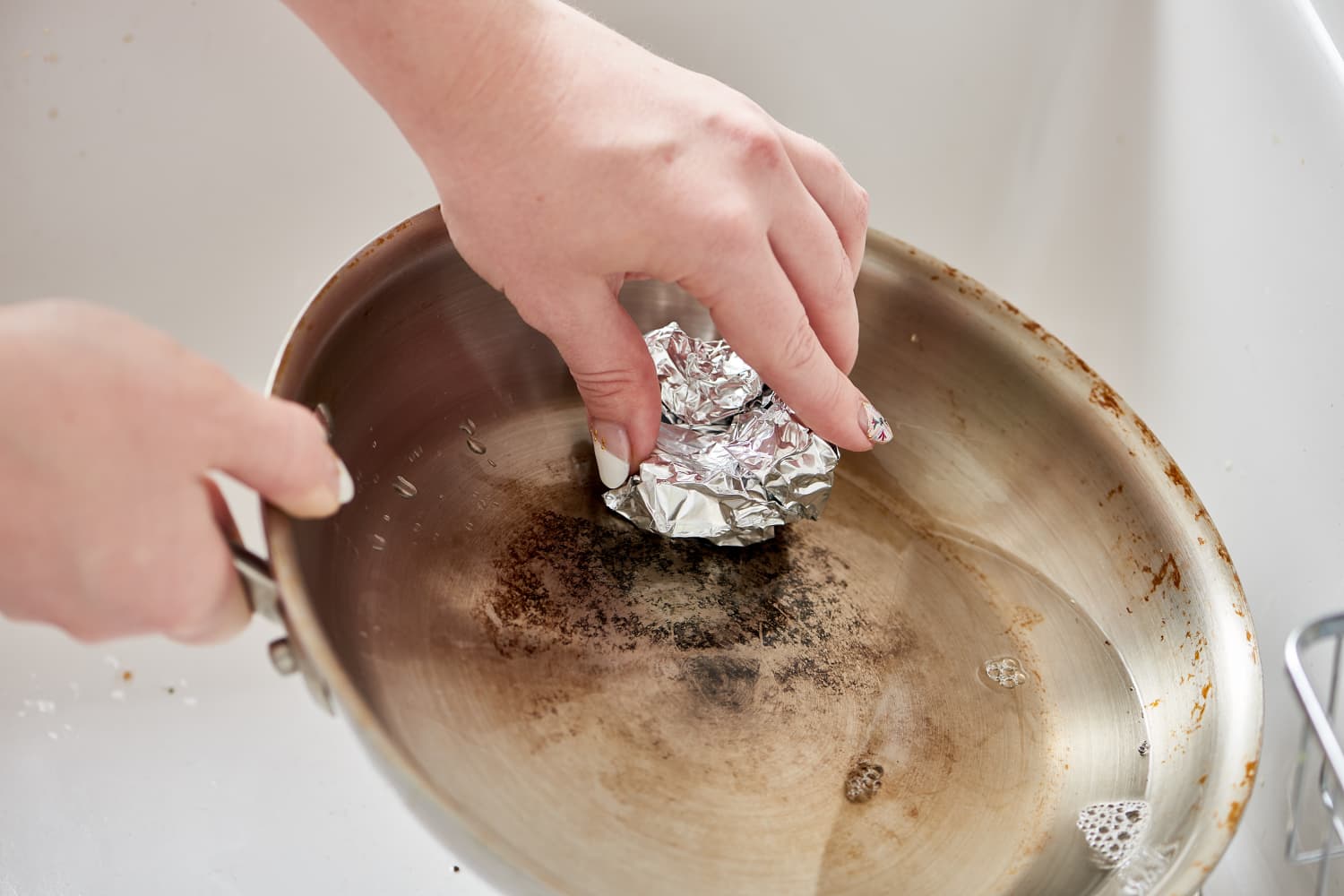 How do you clean cheap silver with tin foil