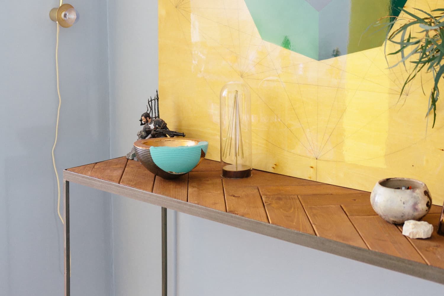 Decorative Letters Forming Word LOVE on Wooden Shelf on White Wall