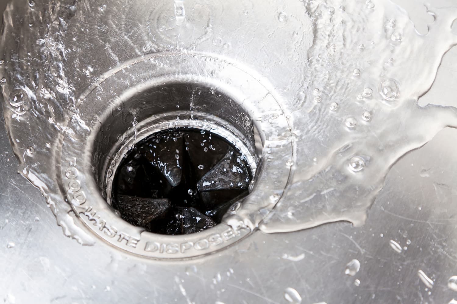 4 Easy Ways to Clean Your Garbage Disposal, According to Plumbers (Using Things You Already Have!)
