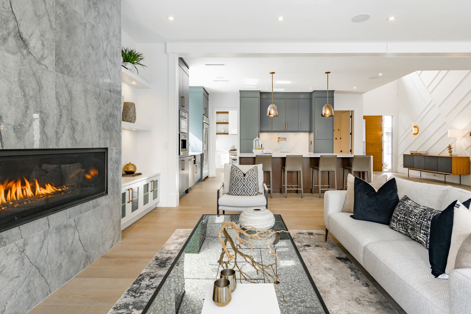 Contemporary Korean apartment living room with open concept dining and kitchen in soft neutral tones