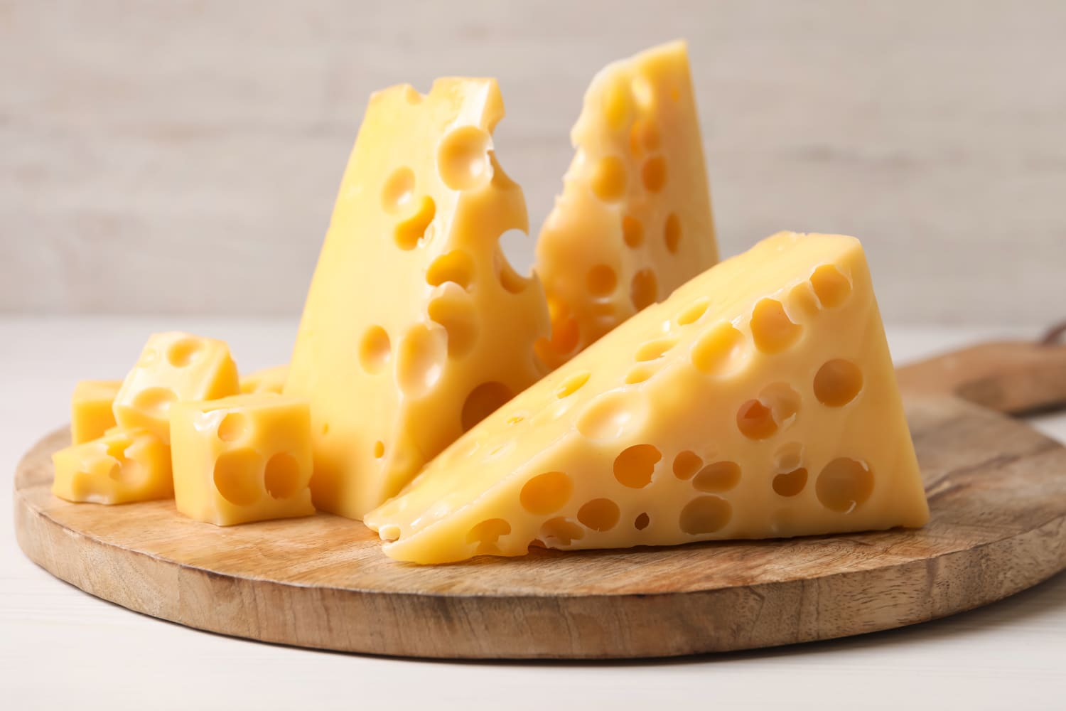 Why Does Swiss Cheese Have Holes? The Real Reason, Explained! The Kitchn