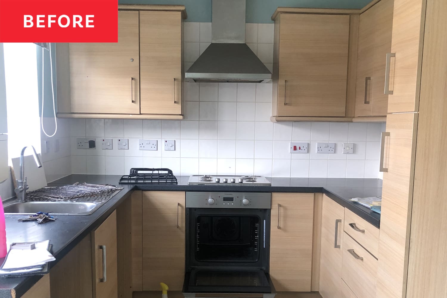 Before & After: Boring ’90s Cabinets Get a Beautiful, Dramatic Makeover With Black Paint (for 0!)