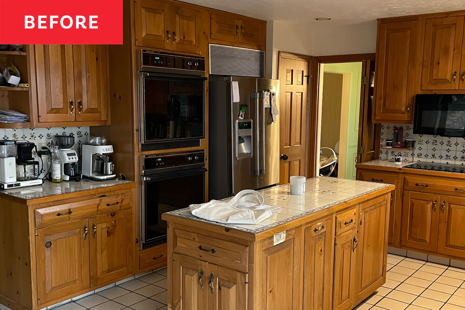 Before & After: Bold Black Cabinets Give a Modern Edge to a “Dated ‘80s” Kitchen