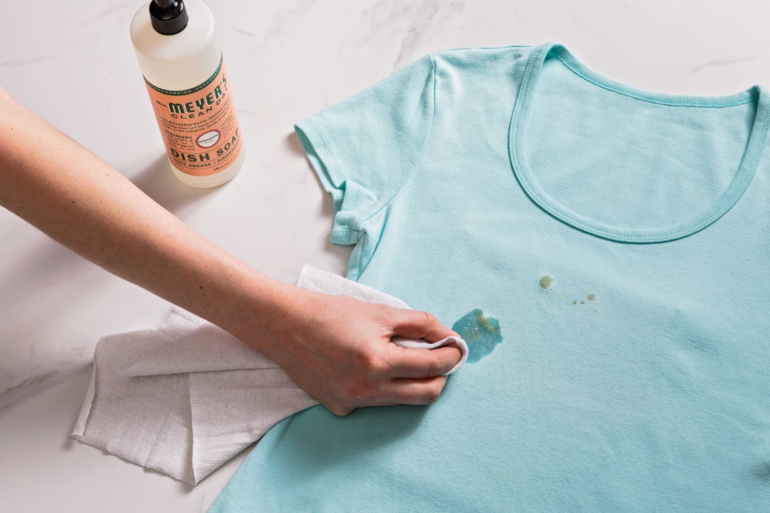 how to get massage oil stains out of clothes
