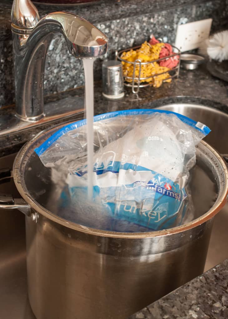 Depiction of the instructions in How to Thaw a Turkey in Cold Water: step 3