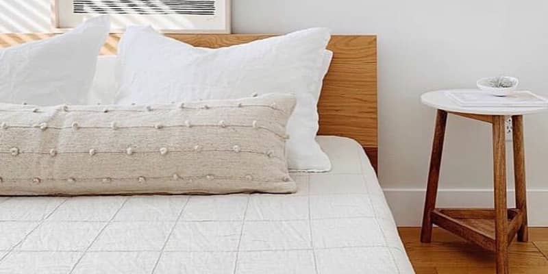 The best bedroom styling trick, the long lumbar pillow