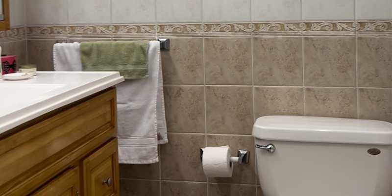 These 3 Nail-Free Finds Completely Transformed My Drab Bathroom