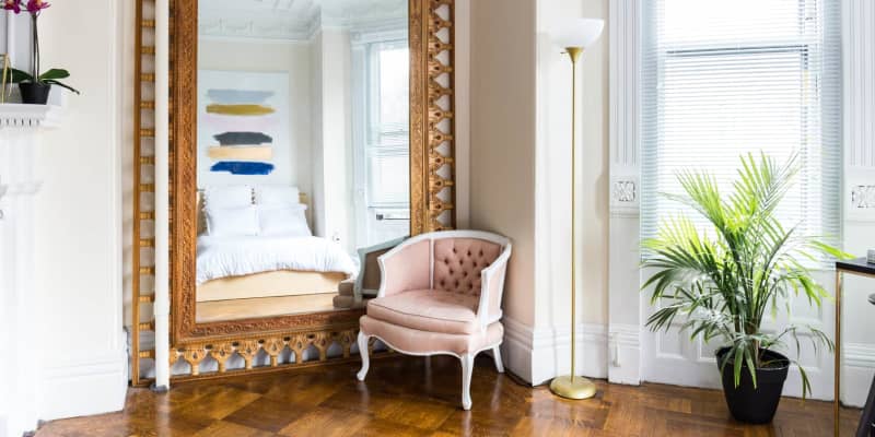 Using mirrors to best sale brighten a room
