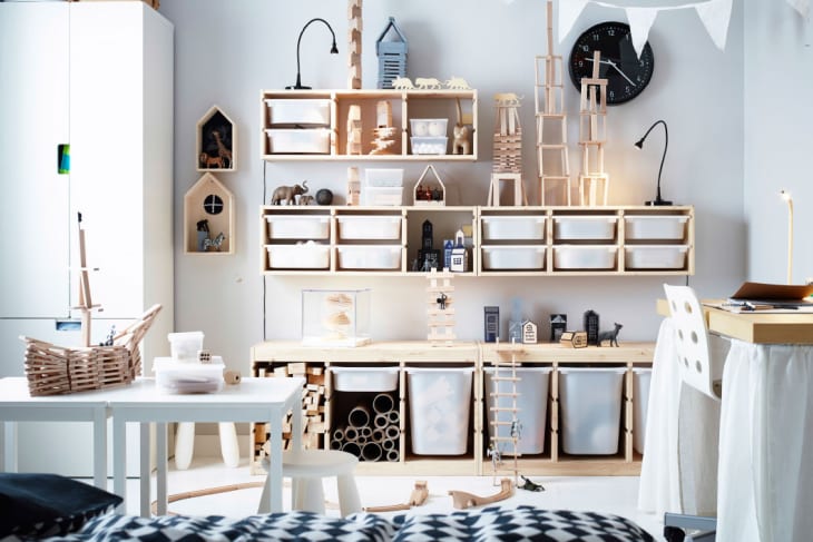 This neutral room has all the storage it needs using IKEA's Trofast system units, two of which are wall-mounted