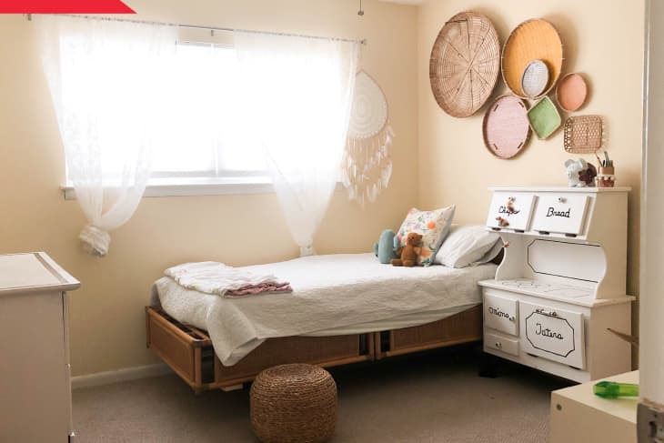 Before: yellow bedroom with decorative basket wall
