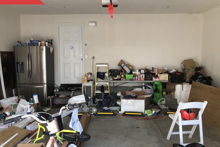 Before: cluttered garage space