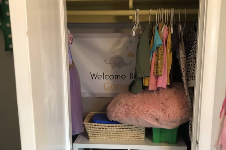 Before: Crowded closet full of boxes and clothes