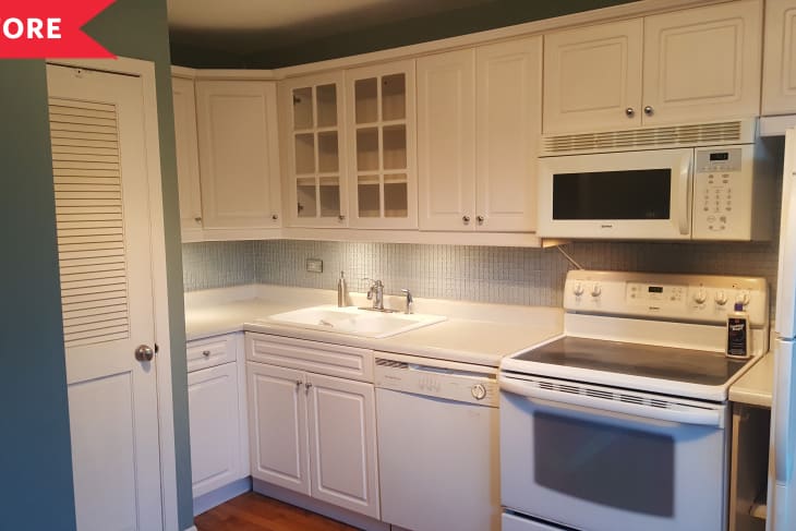 Before: Dated kitchen with white cabinets and white appliances