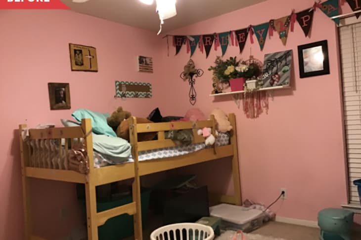 Before: Kids' bedroom with lofted bed, pink walls, and garland