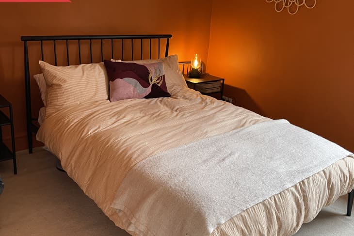 Before: Bedroom with orange walls