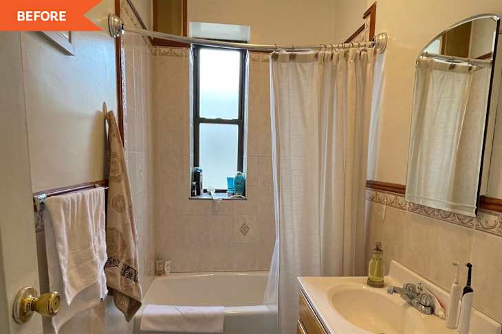 Small bathroom with a shower curtain, window, sink, mirror, and towel rack.