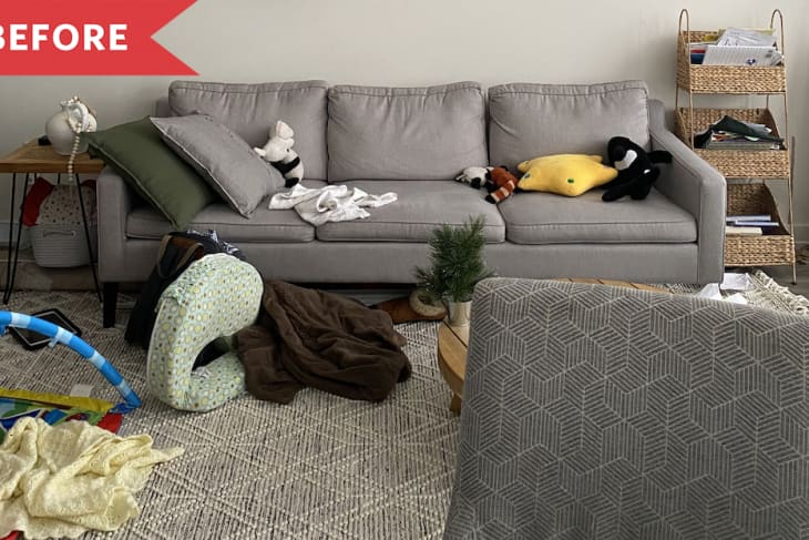 messy living room light grey sofa close up