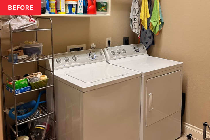 Before two white laundry machines against beige walls