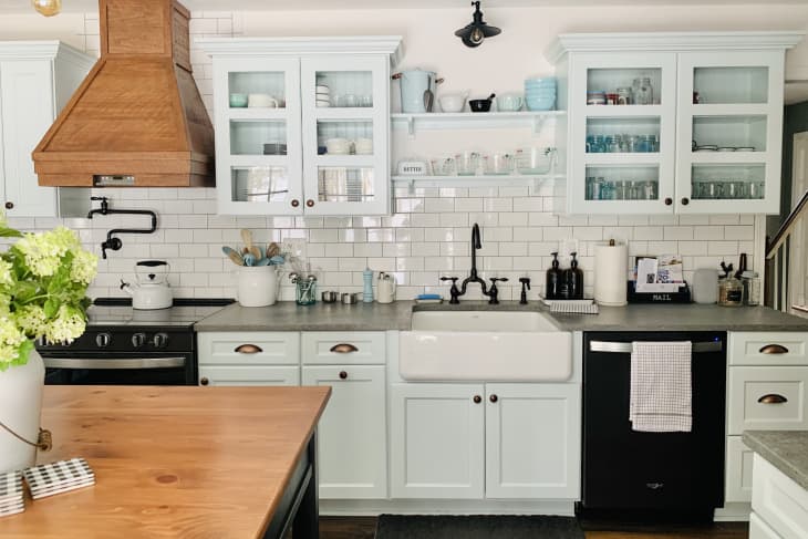 Large kitchen with white cabinets