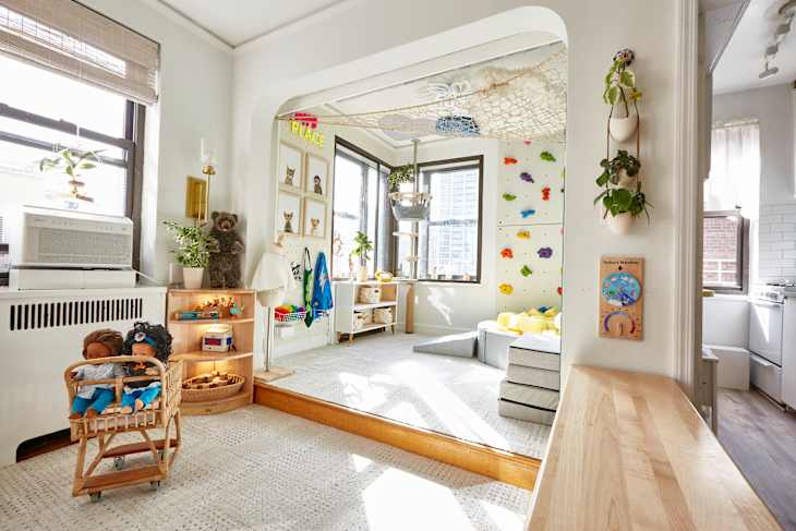 Toys and rock wall in kids play area